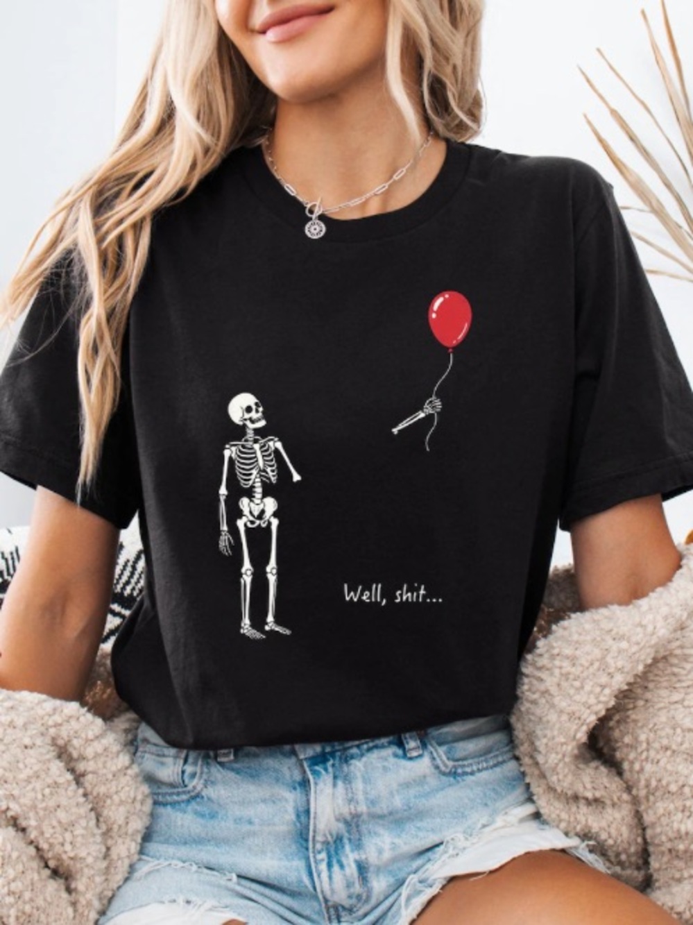 Black Short Sleeve Tee with White Skeleton and Red Balloon Graphic